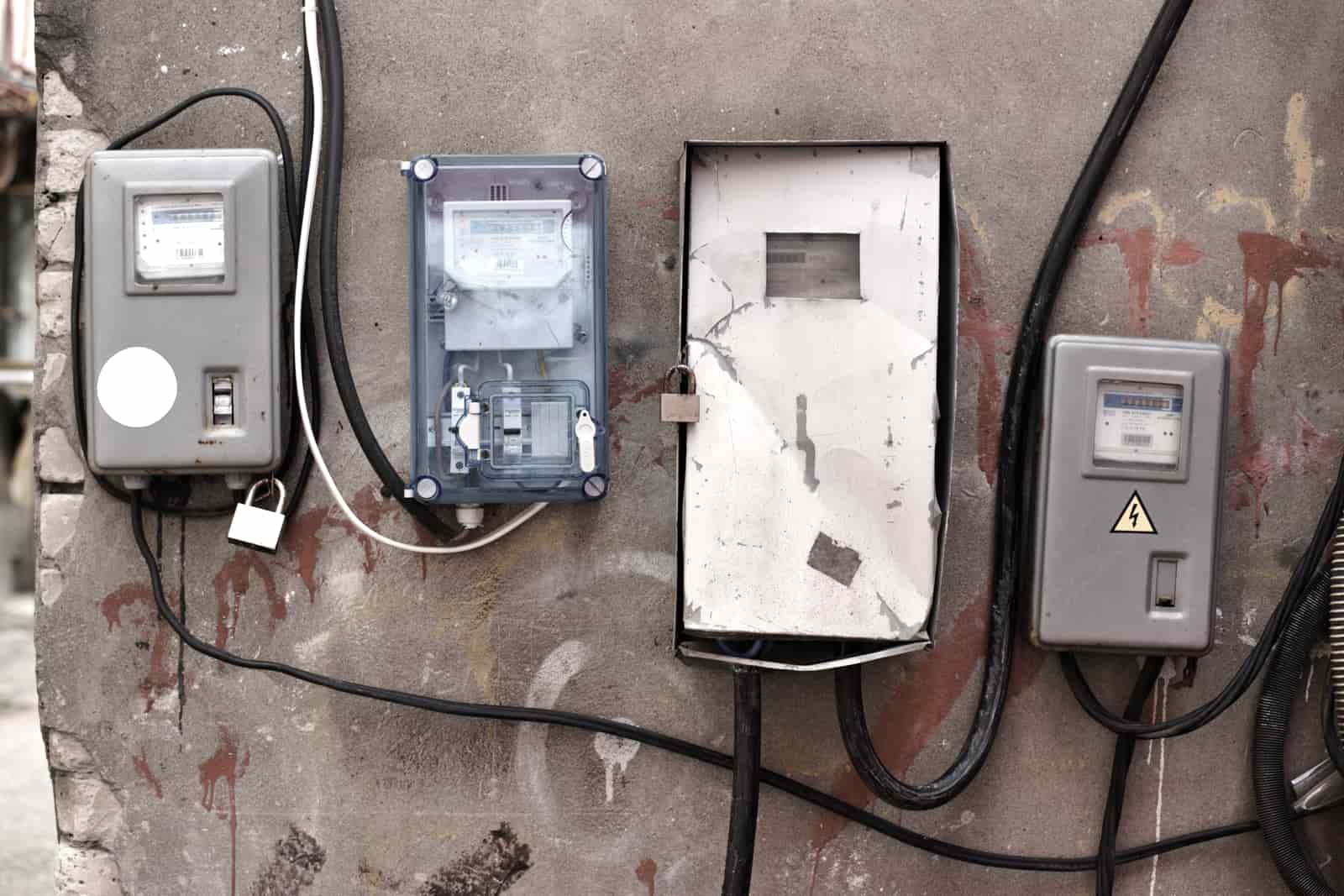 A residential electrical panel with the breaker switches visible