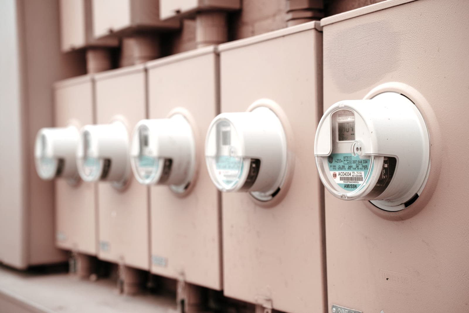 A residential electricity meter on an exterior wall